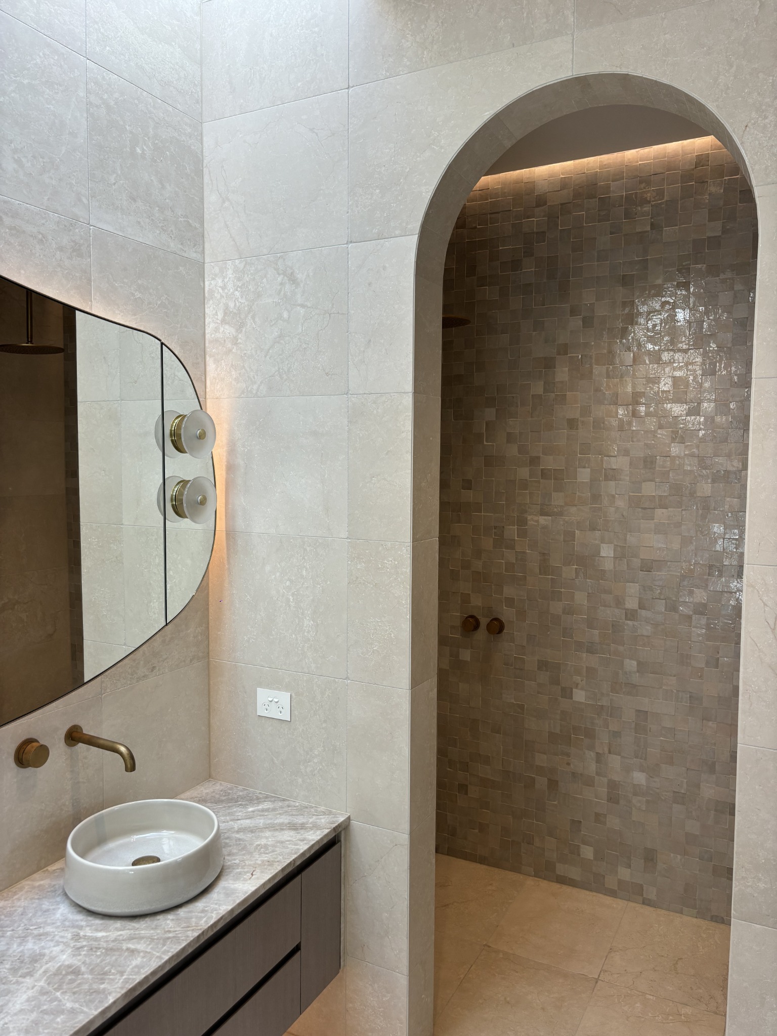 Arched tiled shower